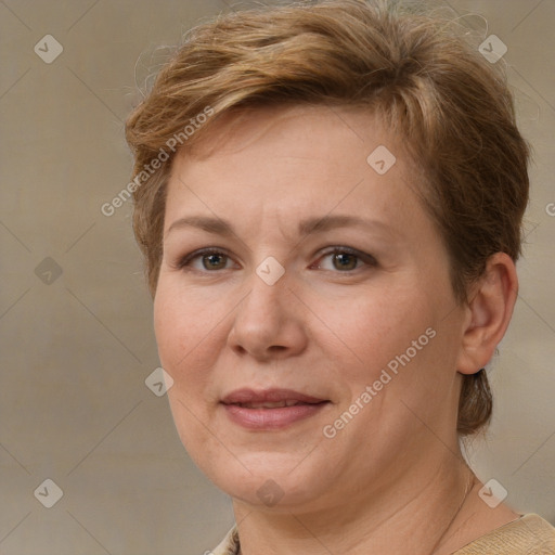 Joyful white adult female with short  brown hair and brown eyes