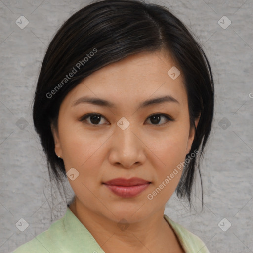 Joyful asian young-adult female with medium  black hair and brown eyes