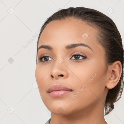 Neutral white young-adult female with long  brown hair and brown eyes