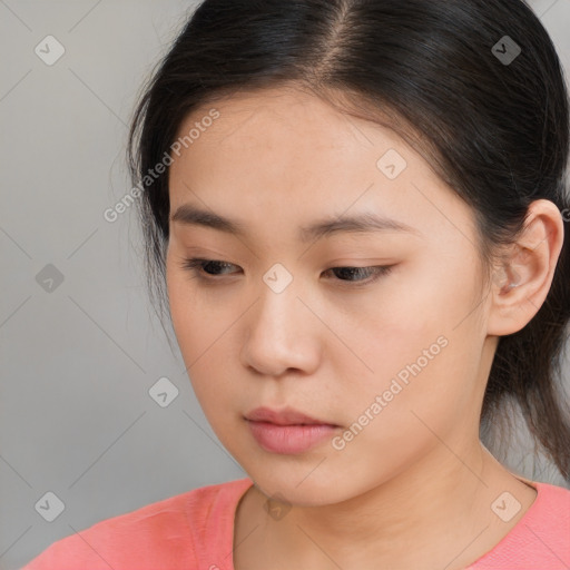 Neutral asian young-adult female with medium  brown hair and brown eyes