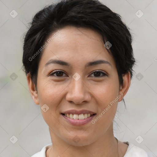 Joyful white adult female with short  brown hair and brown eyes