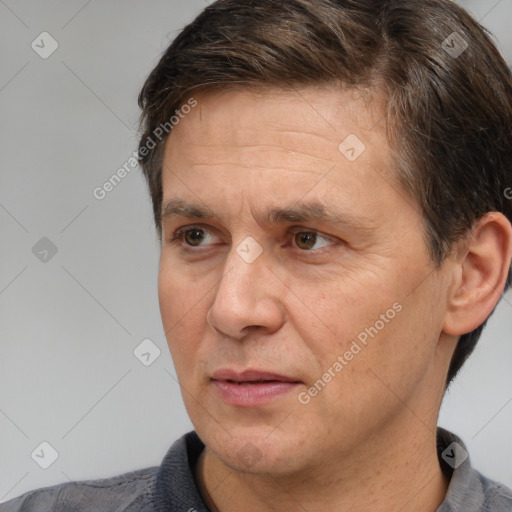 Neutral white adult male with short  brown hair and brown eyes