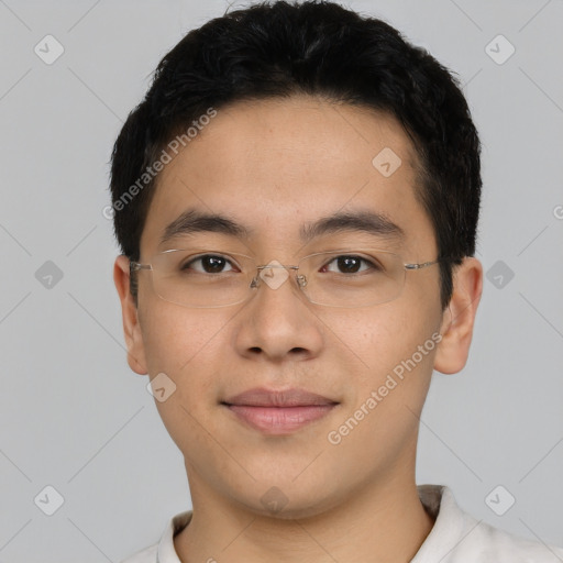 Joyful asian young-adult male with short  black hair and brown eyes