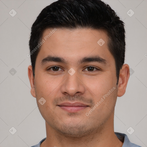 Joyful white young-adult male with short  black hair and brown eyes