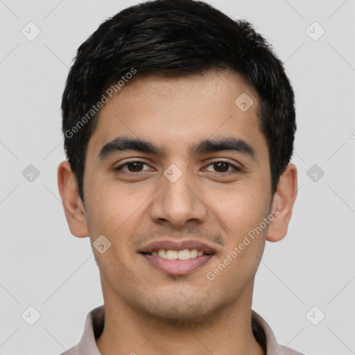 Joyful latino young-adult male with short  black hair and brown eyes