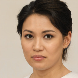 Neutral asian young-adult female with medium  brown hair and brown eyes