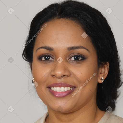 Joyful black young-adult female with medium  brown hair and brown eyes