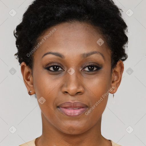 Joyful black young-adult female with short  brown hair and brown eyes