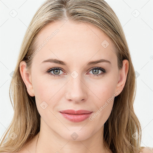 Joyful white young-adult female with long  brown hair and blue eyes