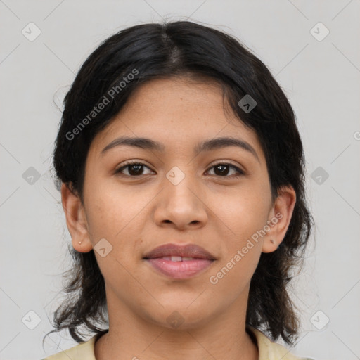 Joyful latino young-adult female with medium  brown hair and brown eyes