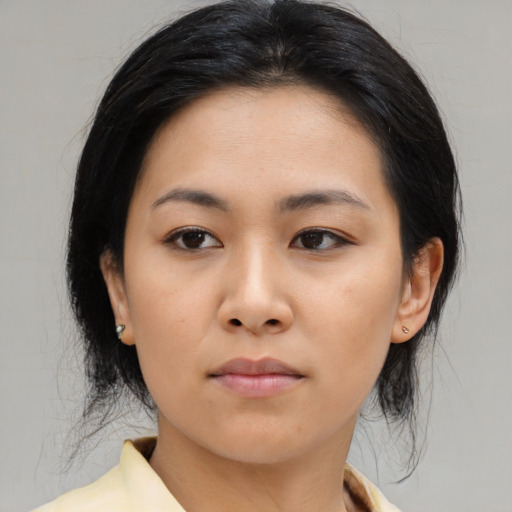 Neutral asian young-adult female with medium  black hair and brown eyes