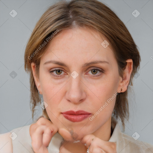 Joyful white adult female with medium  brown hair and brown eyes