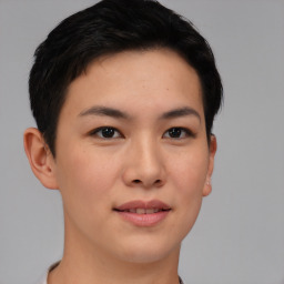 Joyful asian young-adult female with short  brown hair and brown eyes