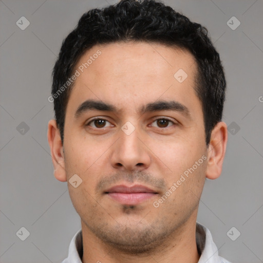 Neutral white young-adult male with short  black hair and brown eyes