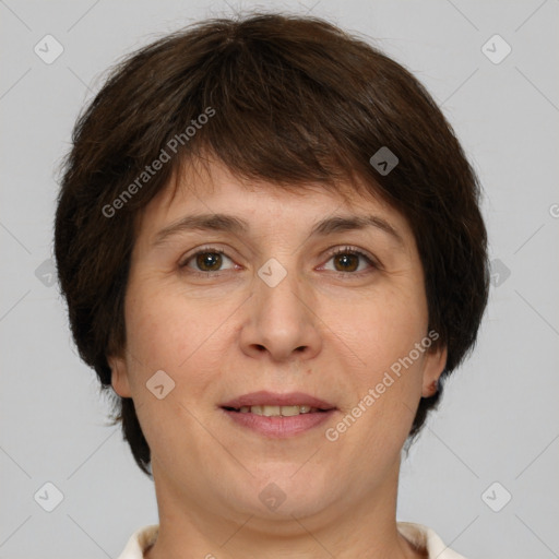 Joyful white adult female with medium  brown hair and brown eyes