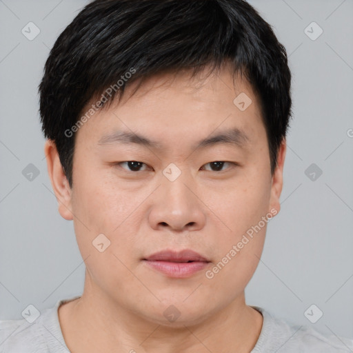 Neutral asian young-adult male with short  brown hair and brown eyes