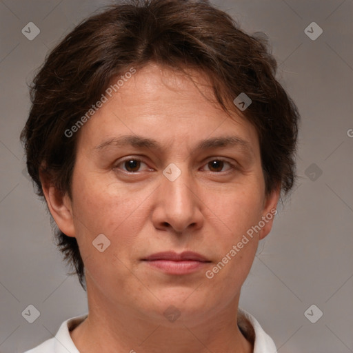 Joyful white adult female with short  brown hair and brown eyes