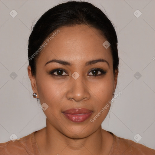 Joyful latino young-adult female with short  black hair and brown eyes