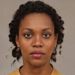 Neutral black young-adult female with medium  brown hair and brown eyes