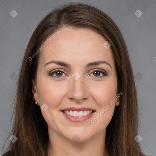 Joyful white young-adult female with long  brown hair and grey eyes