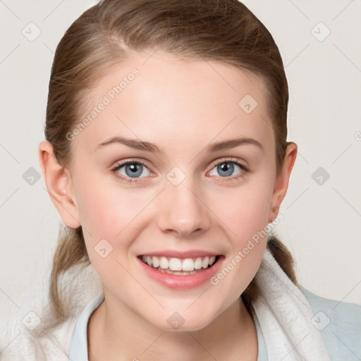 Joyful white young-adult female with medium  brown hair and blue eyes