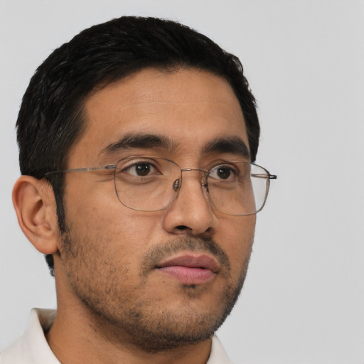 Neutral asian adult male with short  brown hair and brown eyes