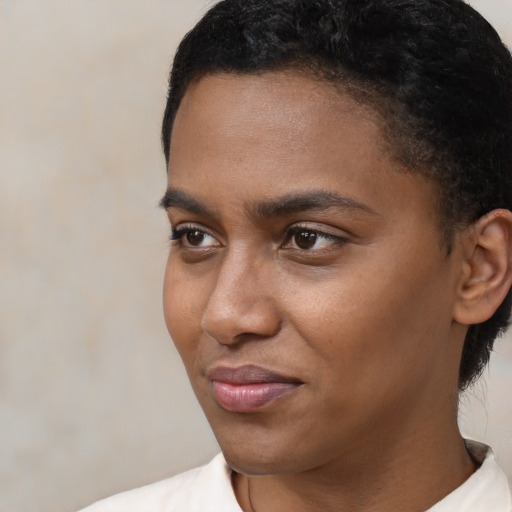 Neutral black young-adult female with short  black hair and brown eyes