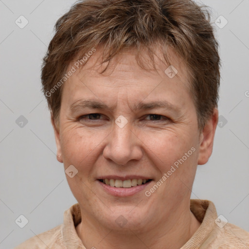 Joyful white adult female with short  brown hair and brown eyes