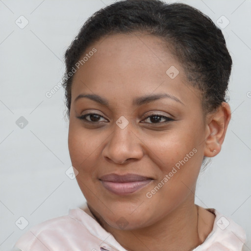 Joyful black young-adult female with short  brown hair and brown eyes