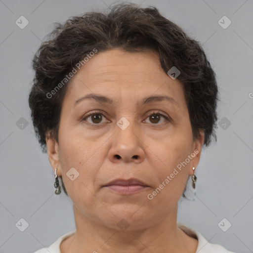 Joyful white adult female with short  brown hair and brown eyes