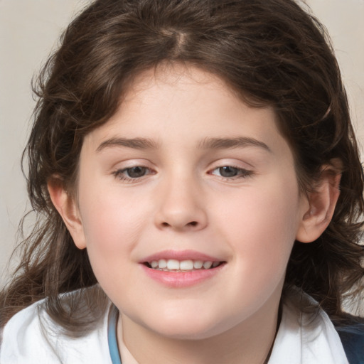 Joyful white child female with medium  brown hair and brown eyes