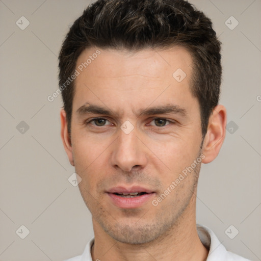 Neutral white young-adult male with short  brown hair and brown eyes