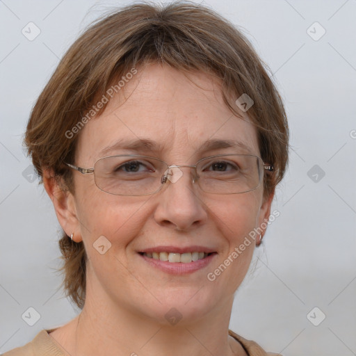 Joyful white adult female with medium  brown hair and brown eyes