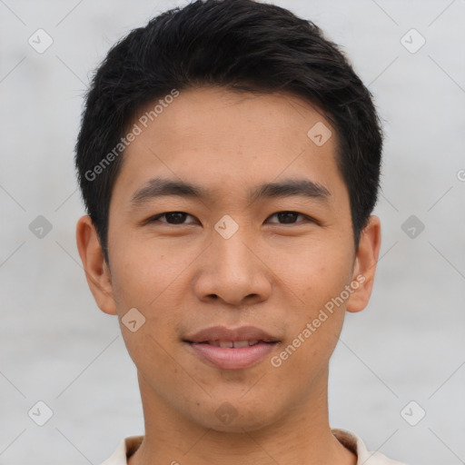 Joyful asian young-adult male with short  black hair and brown eyes