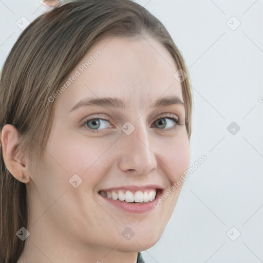 Joyful white young-adult female with long  brown hair and blue eyes