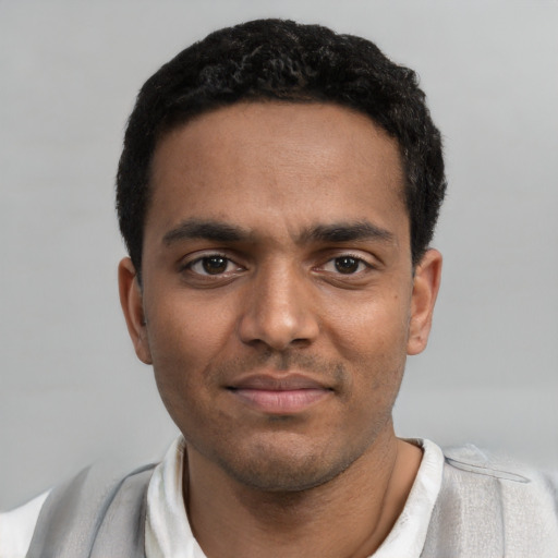 Neutral black young-adult male with short  black hair and brown eyes