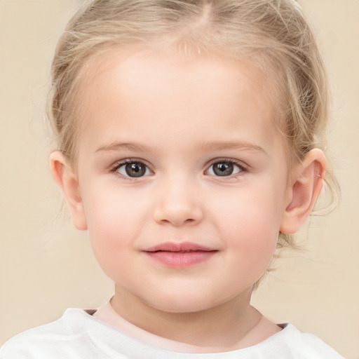 Joyful white child female with medium  blond hair and brown eyes