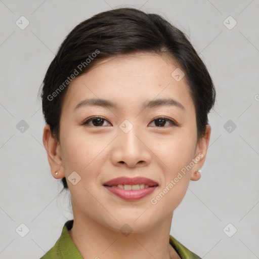 Joyful asian young-adult female with short  brown hair and brown eyes