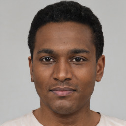 Neutral black young-adult male with short  black hair and brown eyes