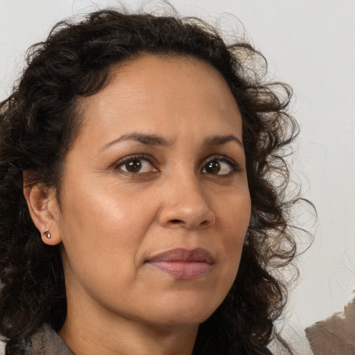 Neutral white adult female with medium  brown hair and brown eyes