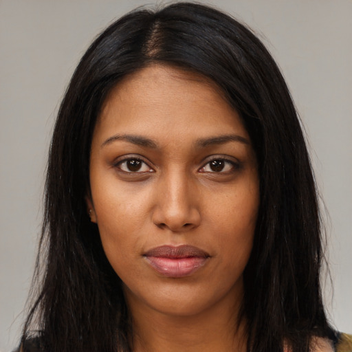Neutral black young-adult female with long  black hair and brown eyes