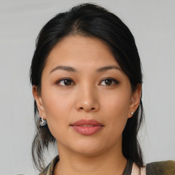 Neutral asian young-adult female with medium  brown hair and brown eyes