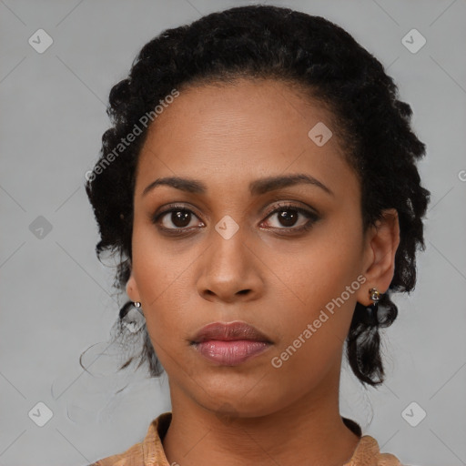 Neutral black young-adult female with medium  black hair and brown eyes