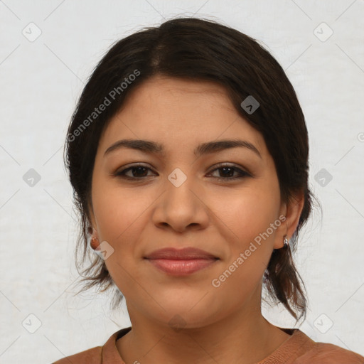 Joyful latino young-adult female with medium  brown hair and brown eyes