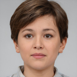 Neutral white young-adult female with short  brown hair and brown eyes