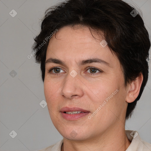 Joyful white adult female with medium  brown hair and brown eyes