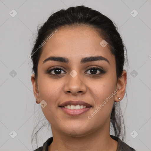 Joyful white young-adult female with long  brown hair and brown eyes