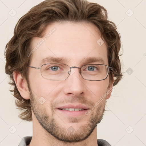 Joyful white adult male with short  brown hair and grey eyes