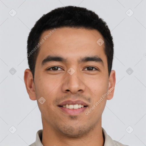 Joyful asian young-adult male with short  black hair and brown eyes