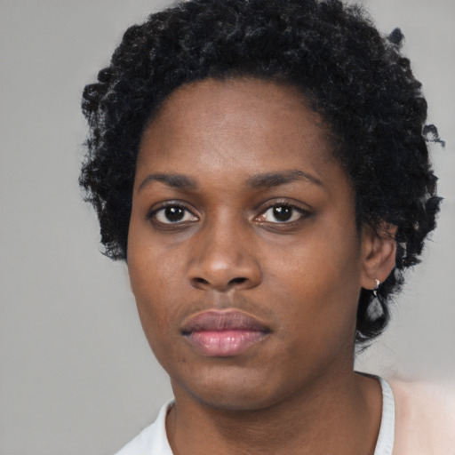 Neutral black young-adult female with short  black hair and brown eyes